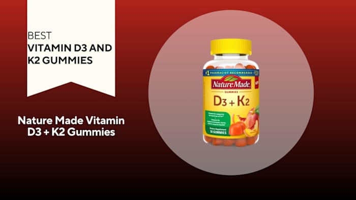 A bottle of Nature Made Vitamin D3 + K2 gummies is pictured against a red background